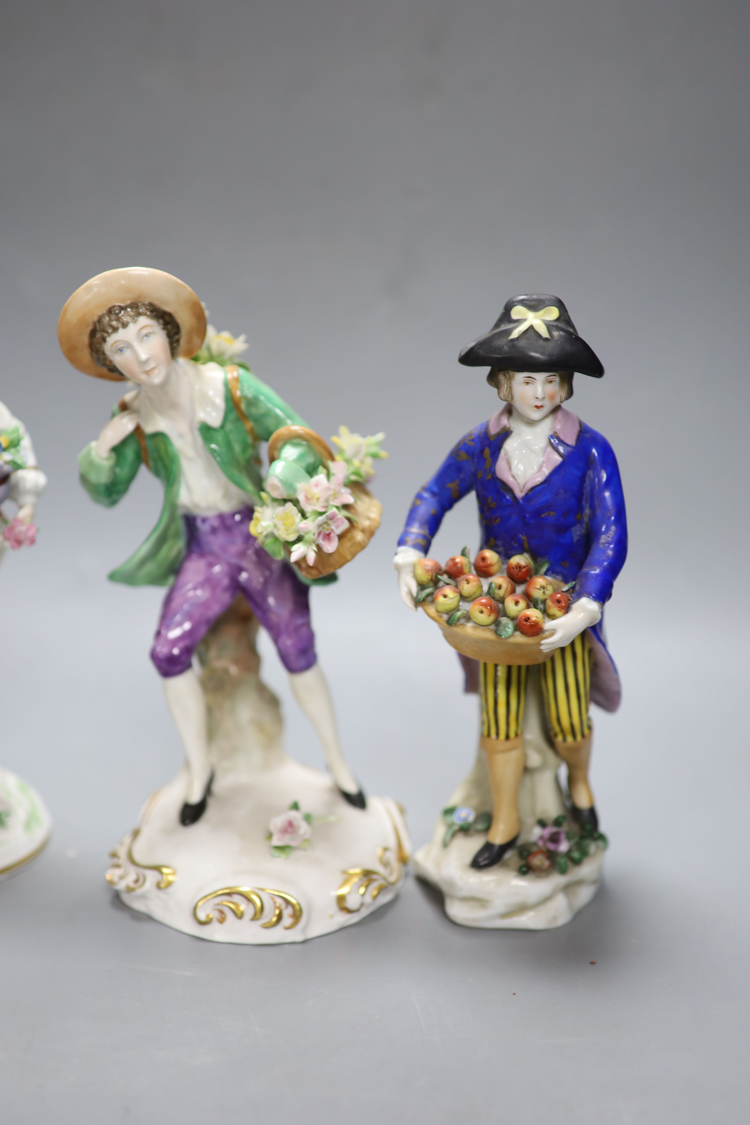 Five Continental figurines of fruit and flower sellers